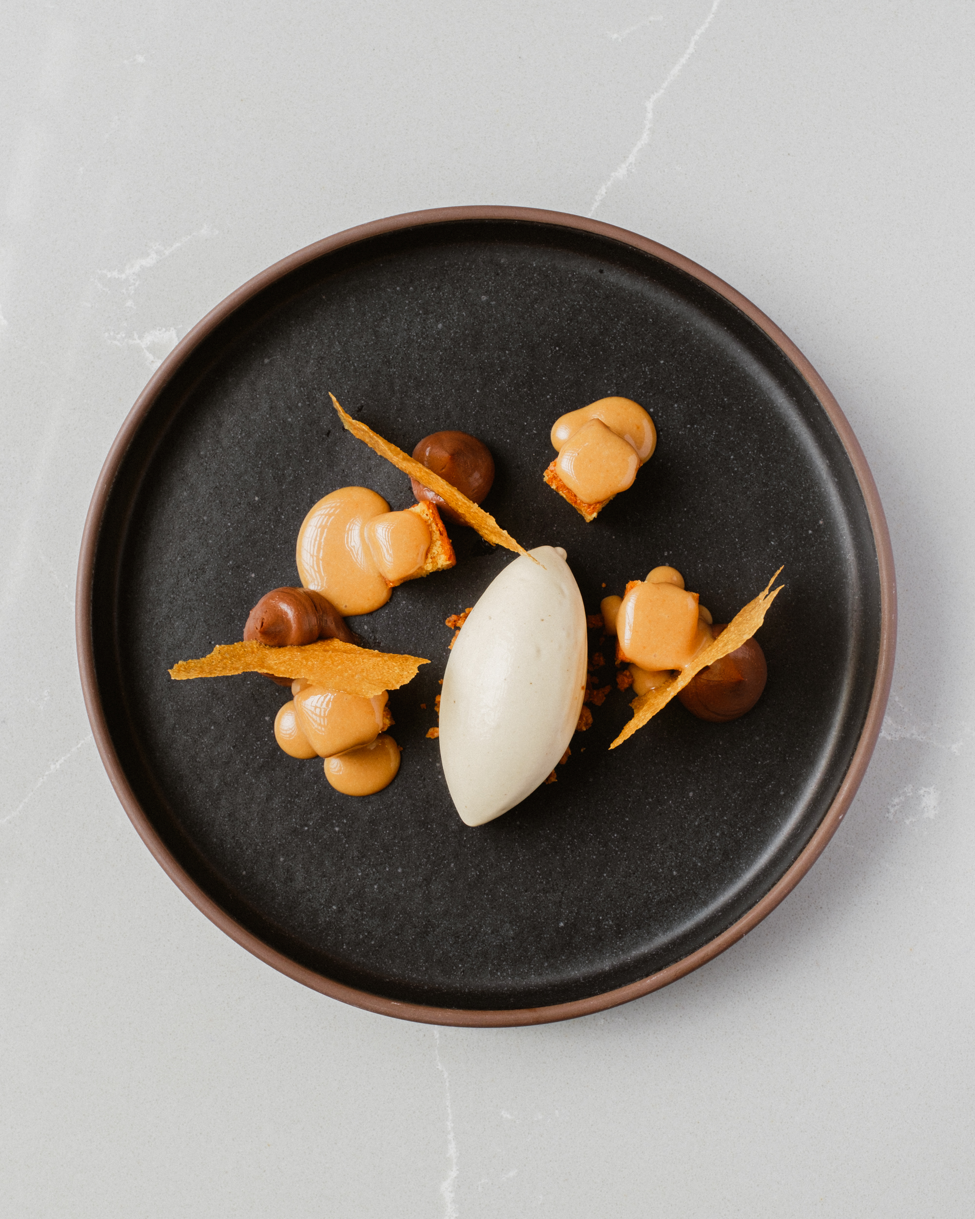 Tasting menu plate at AQUA